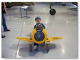 Duncan peddles his way around the hangar on his own.